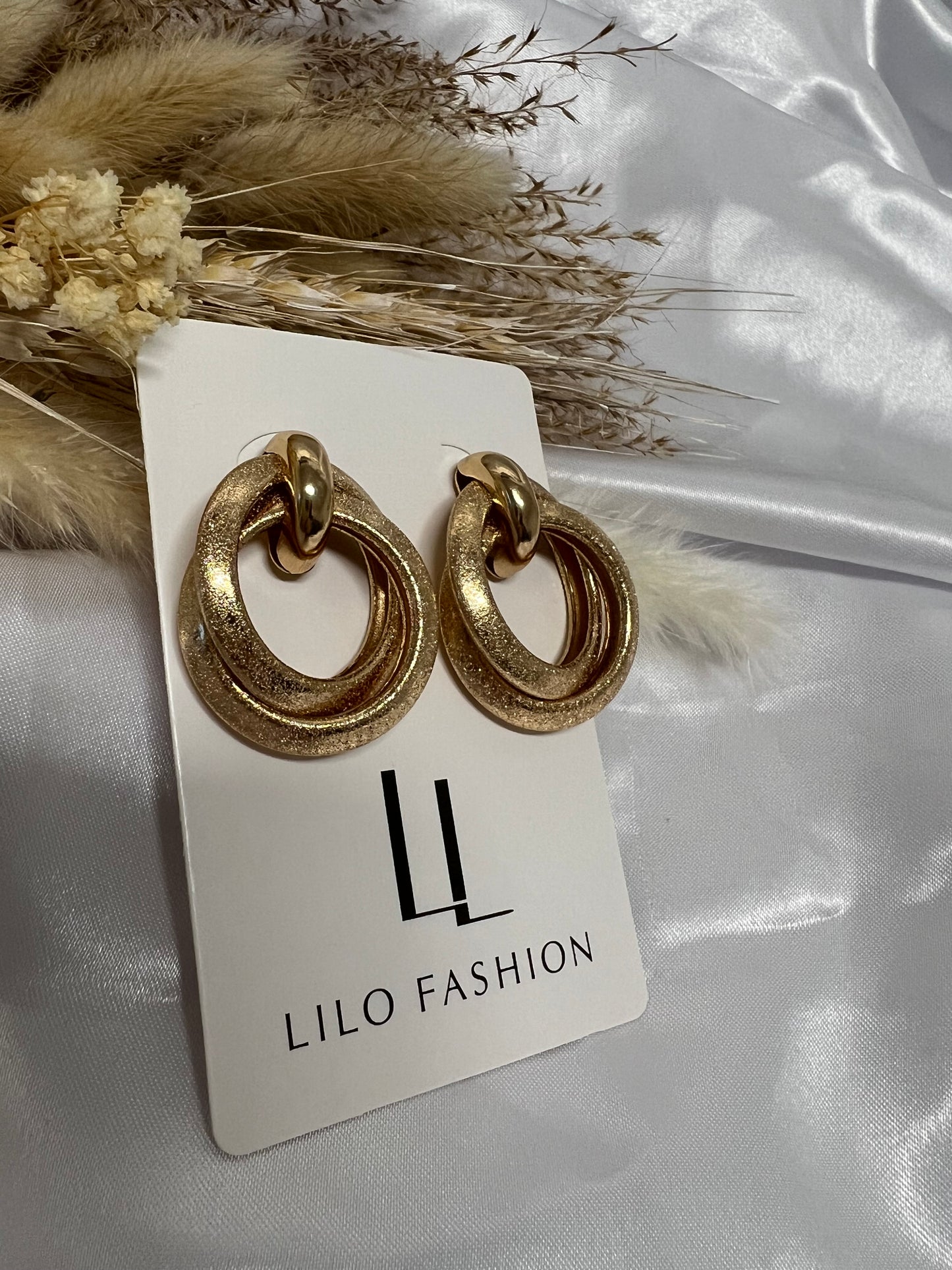 Two time gold earring